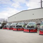 Plow trucks lined up