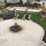 Pavers fountain sunken trampoline play set bocce ball