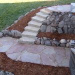 Flagstone patio with stone steps